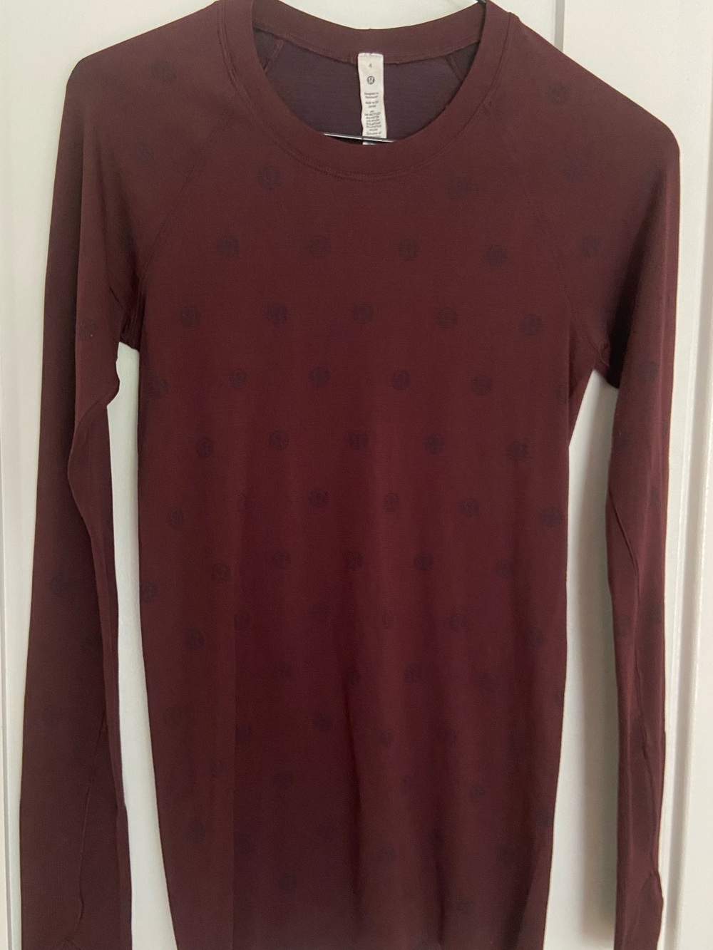 32. Size 4 LULULEMON Burgundy Longsleeve Logo Swiftly Top